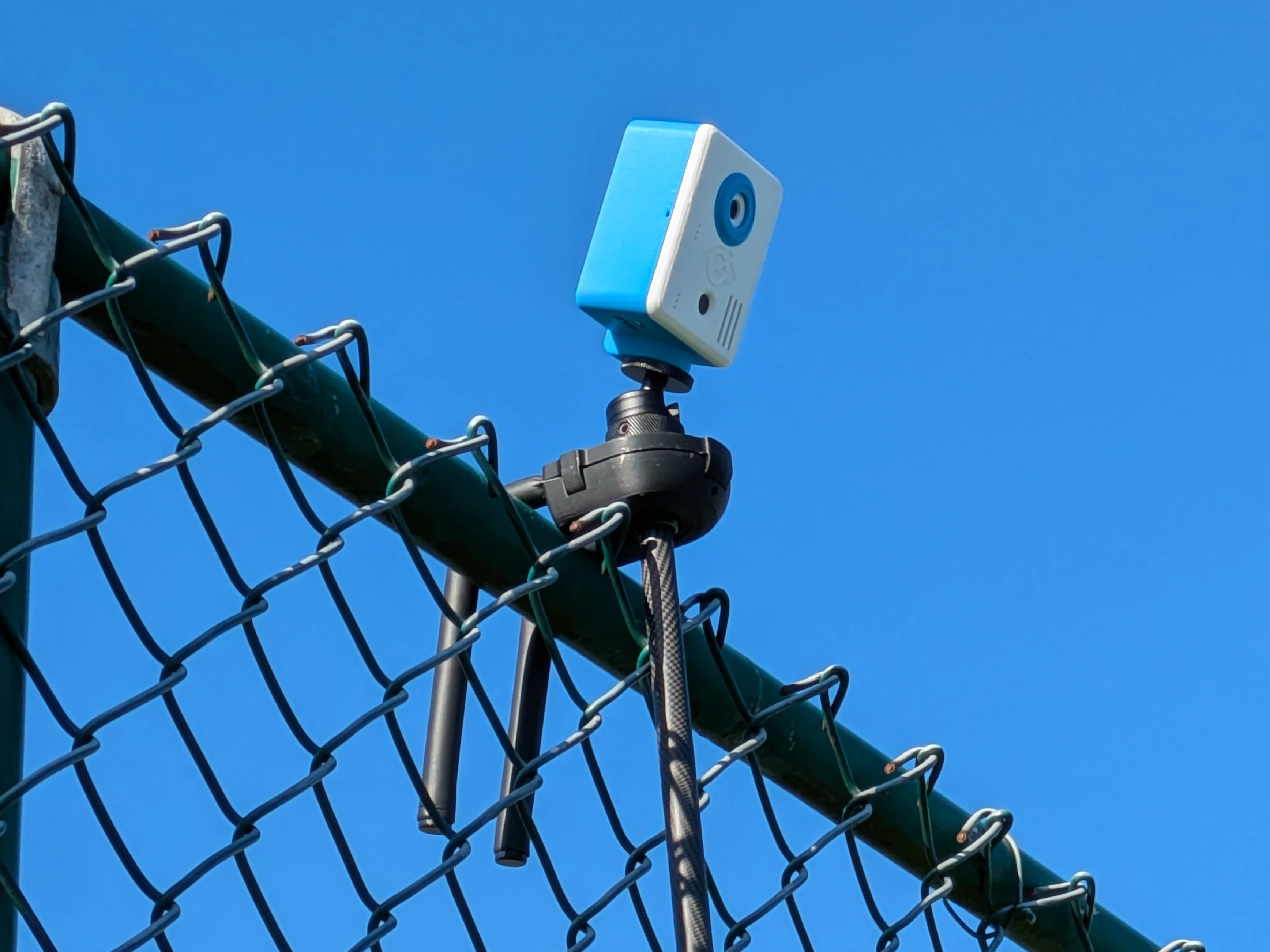 Camera on tennis fence