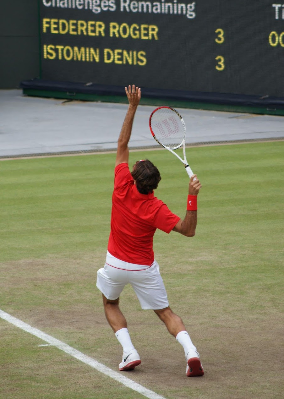Federer serving at Wimbledon